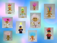 assorted vintage trolls - Marine, artist, gladiator, football  more