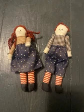 pair of handmade, primitive-style Raggedy Ann and Andy dolls