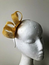 New yellow loop fascinator on a silver metal headband