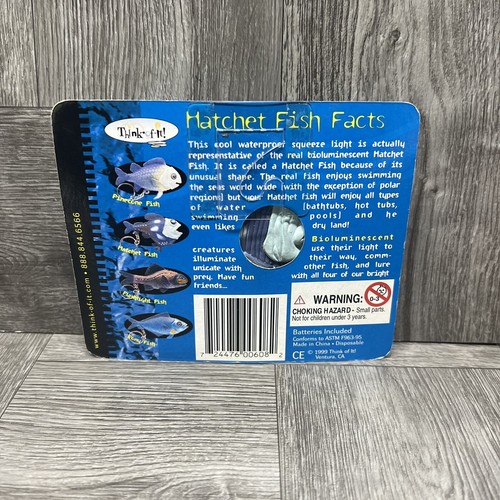 Vintage 1999 Think Of It Hatchet Fish Waterproof Squeeze Light Keychain NOS RARE - Picture 2 of 9