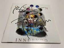 Queen Signed CD Brian May Roger Taylor