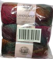 I'm in the process of making a shrug, but I had to stop and take a picture  because Lion Brand's Landscapes yarn in the color Desert Spring is one of  the most