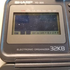 Sharp YO-300 Portable Electronic Organizer 32KB W/Instruction Man. PARTS/REPAIR