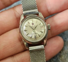 VINTAGE RADO Green Horse AUTOMATIC DATE LADY'S Silver Dial with mesh band.