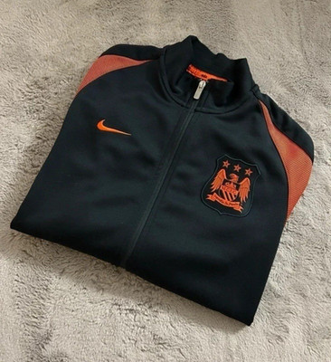 Nike Manchester City Trainingsjacke Schwarz/Orange mit Reißverschluss-Taschen
