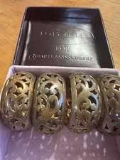 Lois Hill copper napkin rings 4 in matching set filgree cut out design.