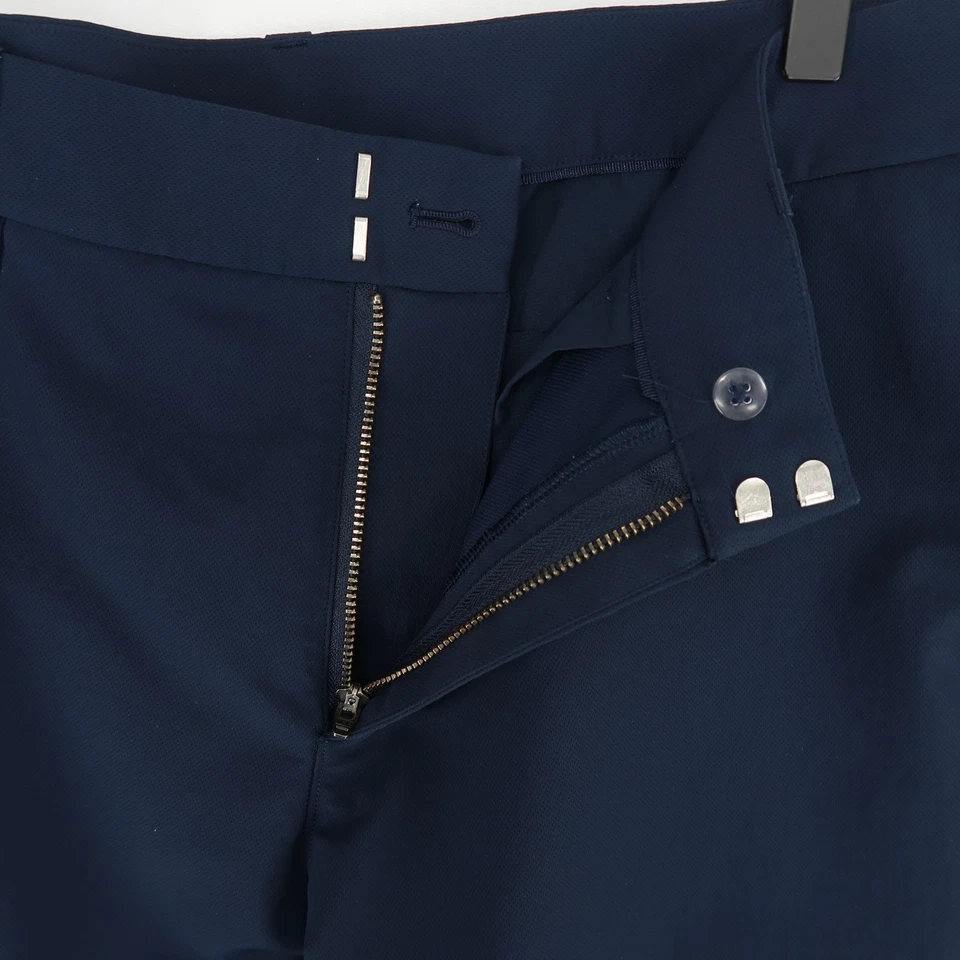 Pantalones chinos de golf ligeros Lululemon para hombre 36 azul marino frente plano Foto 4 de 4