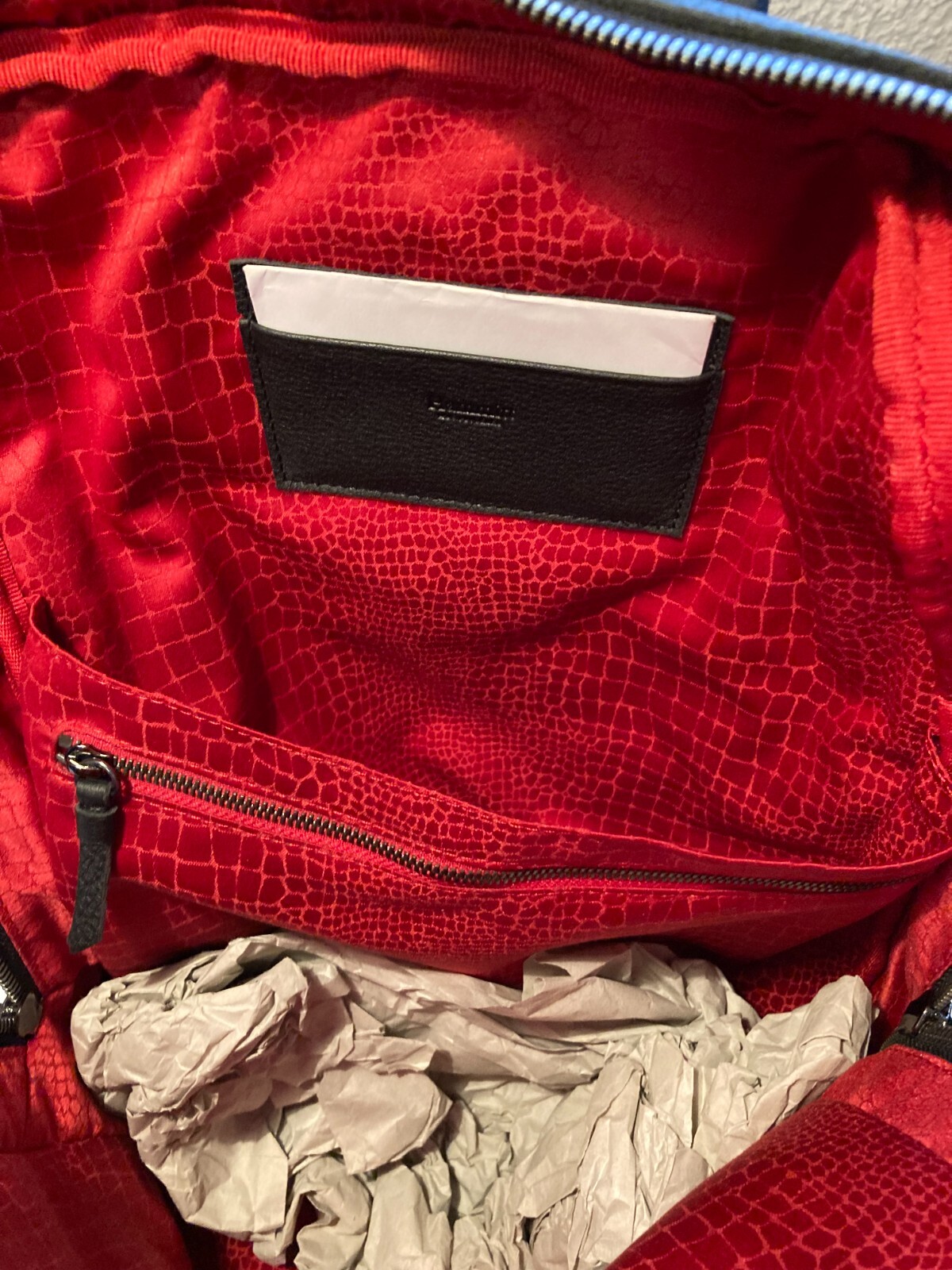 REBECCA MINKOFF black leather Backpack/Purse, red lining; Gently used