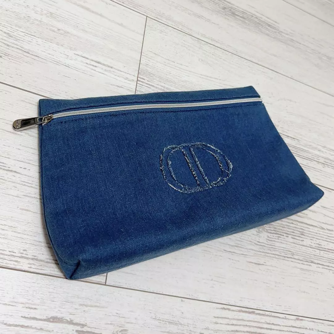 Christian Dior nouveauté denim logo pochette zippée sac pochette marine Dior beauté neuf