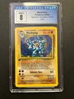 Pokemon TCG Machamp Holo 1st Edition 8/102 - CGC 8 - Base Set