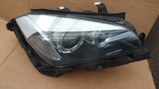 BMW X1 E84 2009-12 GENUINE BI- XENON HEADLIGHT O/S RIGHT DRIVER SIDE