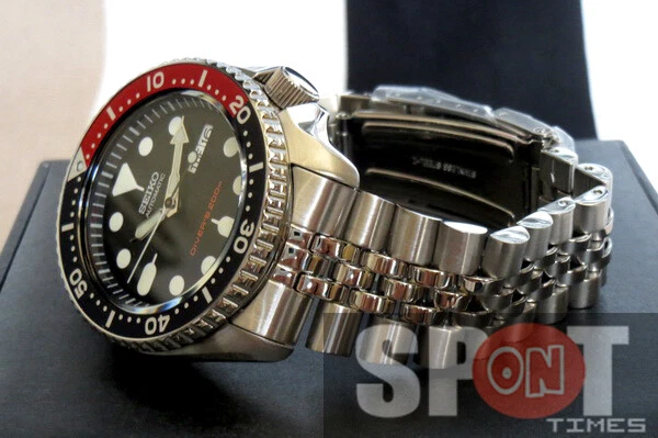  Seiko SKX009K2 reloj analógico automático de acero inoxidable  para hombre : Ropa, Zapatos y Joyería