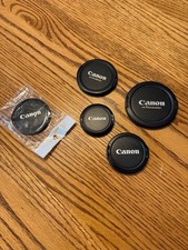 Set of 7 Genuine Canon Lens Pinch Caps