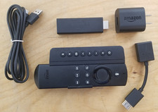 Transmisor multimedia Amazon Fire TV Stick (1ª generación) - W87CUN con control remoto y clic lateral