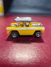 Aurora AFX Magnatraction 1909 Ford Baja Bronco Yellow