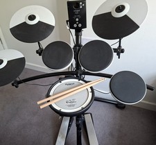Roland TD-1K Electronic V Drum Kit with mesh snare drum. Sticks not included.