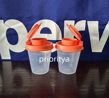 Tupperware Mini Tupper Salero y Pimentero Enanos Juego de 2 Tapa Coral Nuevo