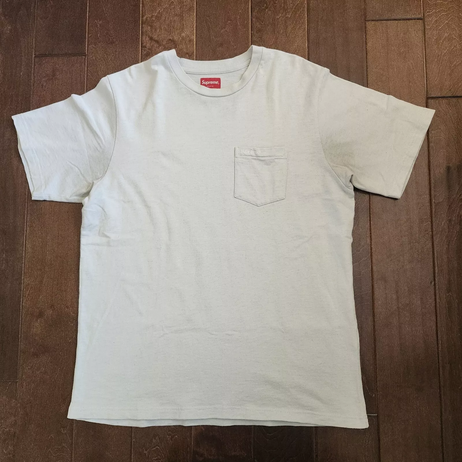 Tee shirt homme Supreme bleu poche avec logo onglet à la poche   Taille L