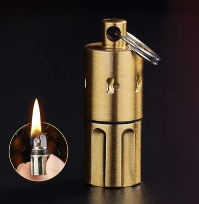 GOLD MINI EDC CAPSULE LIGHTER KEYCHAIN WATERPROOF CAMPING ZIPPO SURVIVAL FLINT - image 1 of 2
