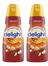 Different flavors of International Delight Liquid Coffee Creamer 32 oz pack of 2