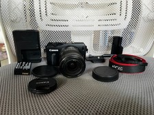 Cámara digital Canon EOS M sin espejo negra con lente de 18-55 mm y batería ficticia