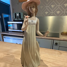 NAO Porcelain Figurine Girl Cream Dress Pink Hat Holding Flower #159