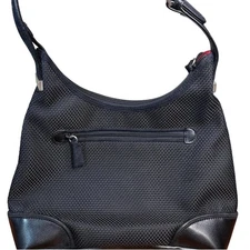 The SAK Black Mesh & Faux Leather Shoulder Bag with Zipper Closure