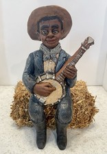 Banjo Playing Cowboy 8 1/2” Tall Figurine with Bale of Hay