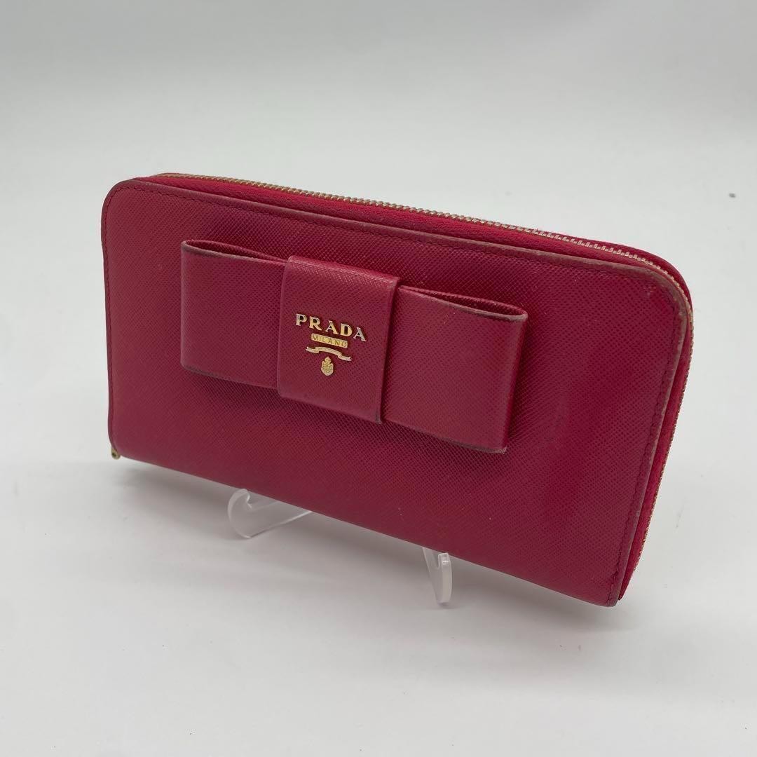 Prada Ribbon Leather Red Saffiano Round Zip Wallet Campaign