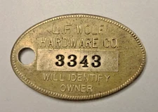 Vtg Charge Coin Brass Tag: L F WOLF HARDWARE CO; Mt Clemens Michigan #3343