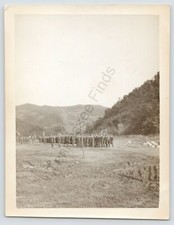 Black  White Photo Of A Company Of Army Soldiers In The Mountains Of Korea