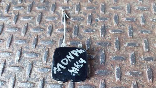 Rear tow hook cover