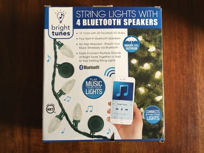 string lights with 4 bluetooth speakers