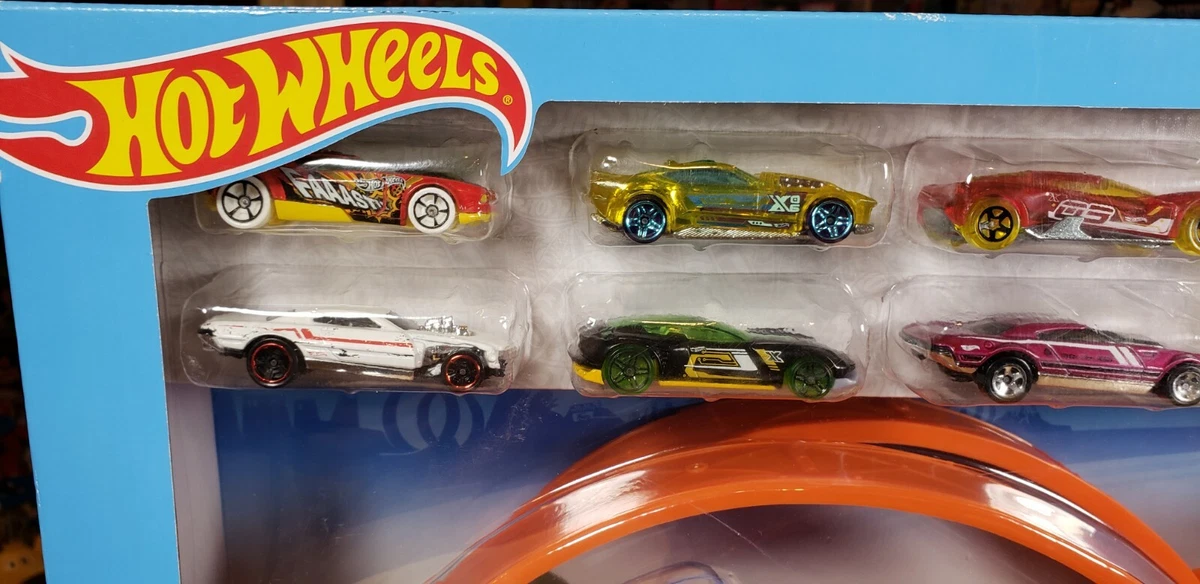 Hot wheels stunt & go hauler with 10 vehicles top