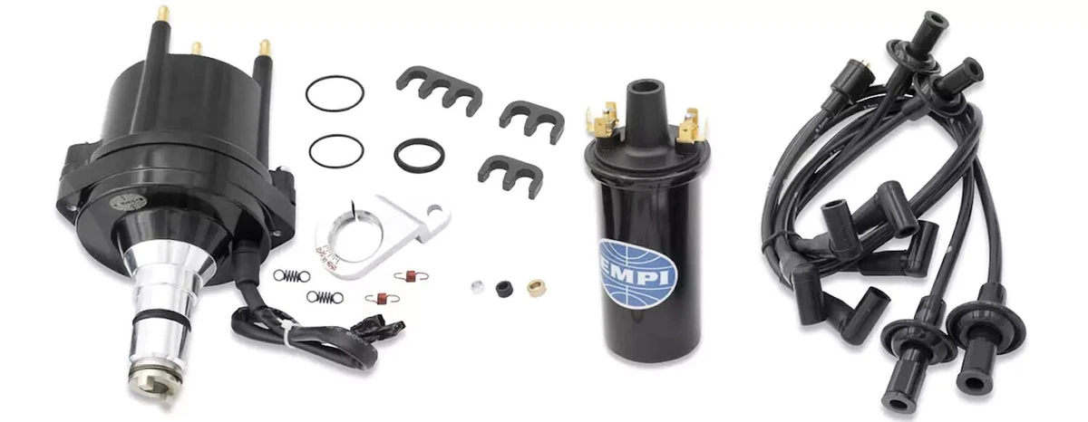 An EMPI ignition kit for Type 1 VW engines with a distributor, ignition coil, and spark plug wires.
