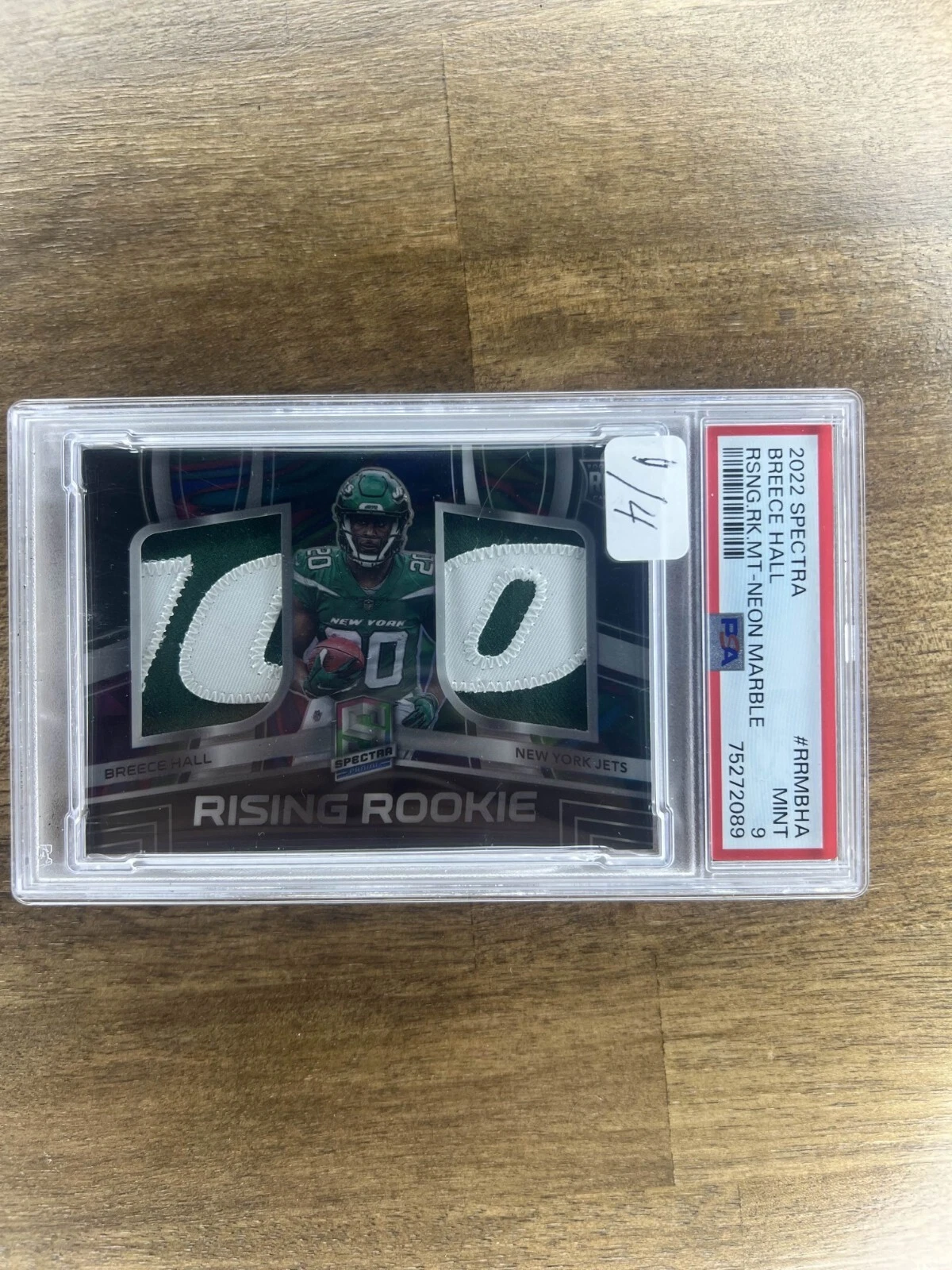 Breece Hall Panini Spectra Rising Rookie Materials #RRMBHA Neon Marble