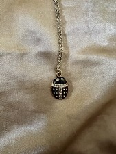 Women s black lady bug necklace