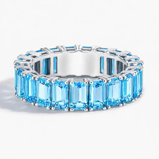 Swiss Blue Topaz Emerald Cut 6x4mm Eternity Band Ring With Rhodium Plated