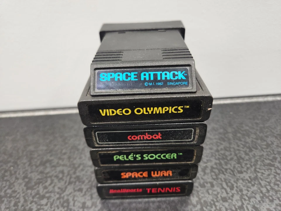 Лот (6) винтажных игровых картриджей Atari 2600: боевые, космические войны, видеоолимпийские игры... - Изображение 3 из 4