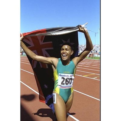 Cathy Freeman of Australia celebrates after winning the 200 400 m 1994 Old Photo
