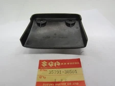 SUZUKI TS 125/100/185/250 NOS COVER REAR COMBINATION LAMP   35791-30501    77-79