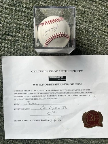 Cal Ripken Jr.  Autographed Major League Baseball With Case And COA.