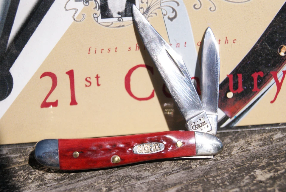 CAIXA XX 2000 FACA MILLENNIUM FACA DE AMENDOIM OSSO VERMELHO RARA 1 DE 105 FEITA PAT. 6220 - Imagem 3 de 4