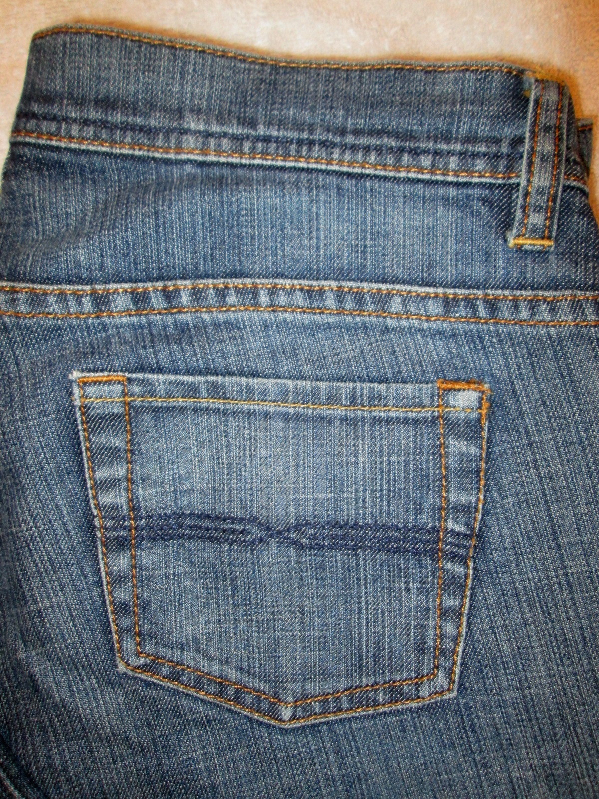 70s style low rise flare jeans with a medium wash