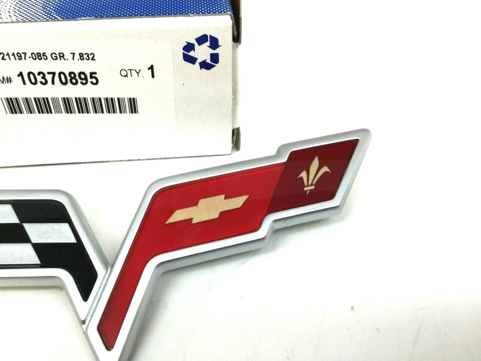 Chevrolet Corvette 2005-2008 parachoques delantero parrilla central bandera emblema insignia OEM Foto 3 de 4