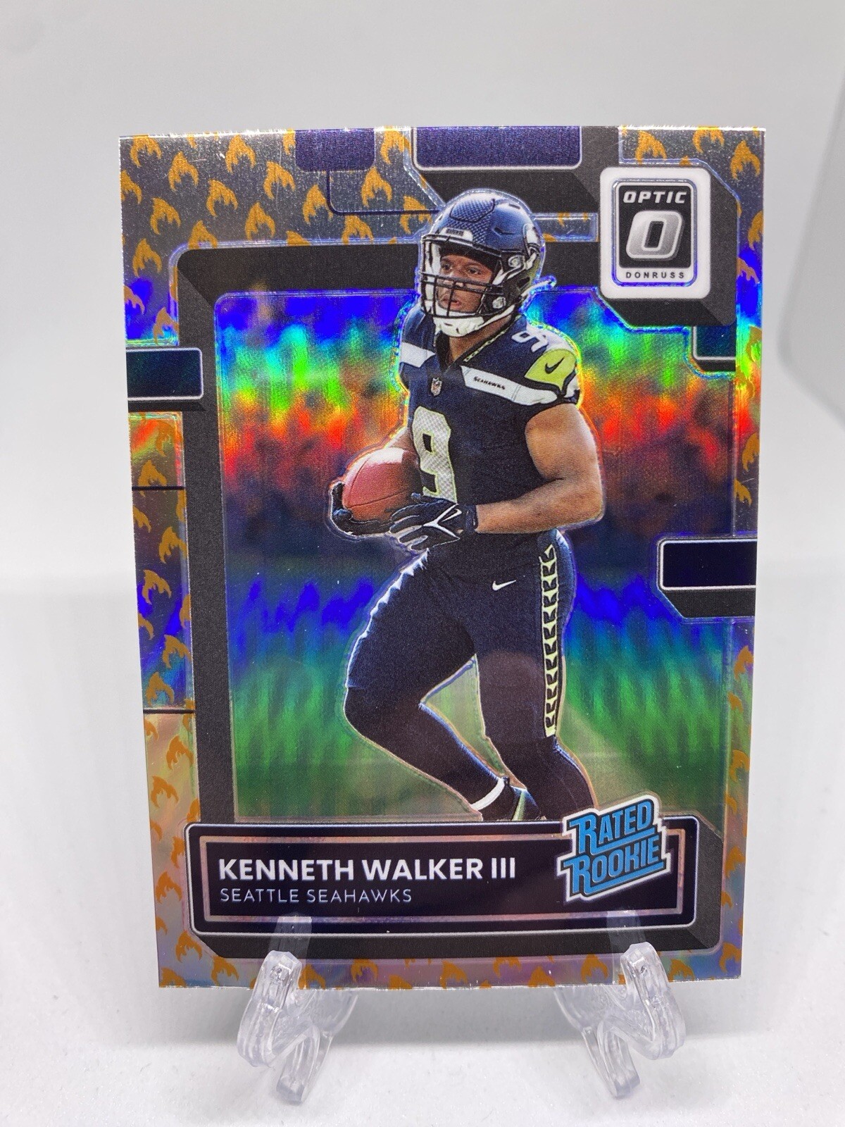Kenneth Walker III 2022 Optic Rated Rookie Fire Emoji Prizm RC #218