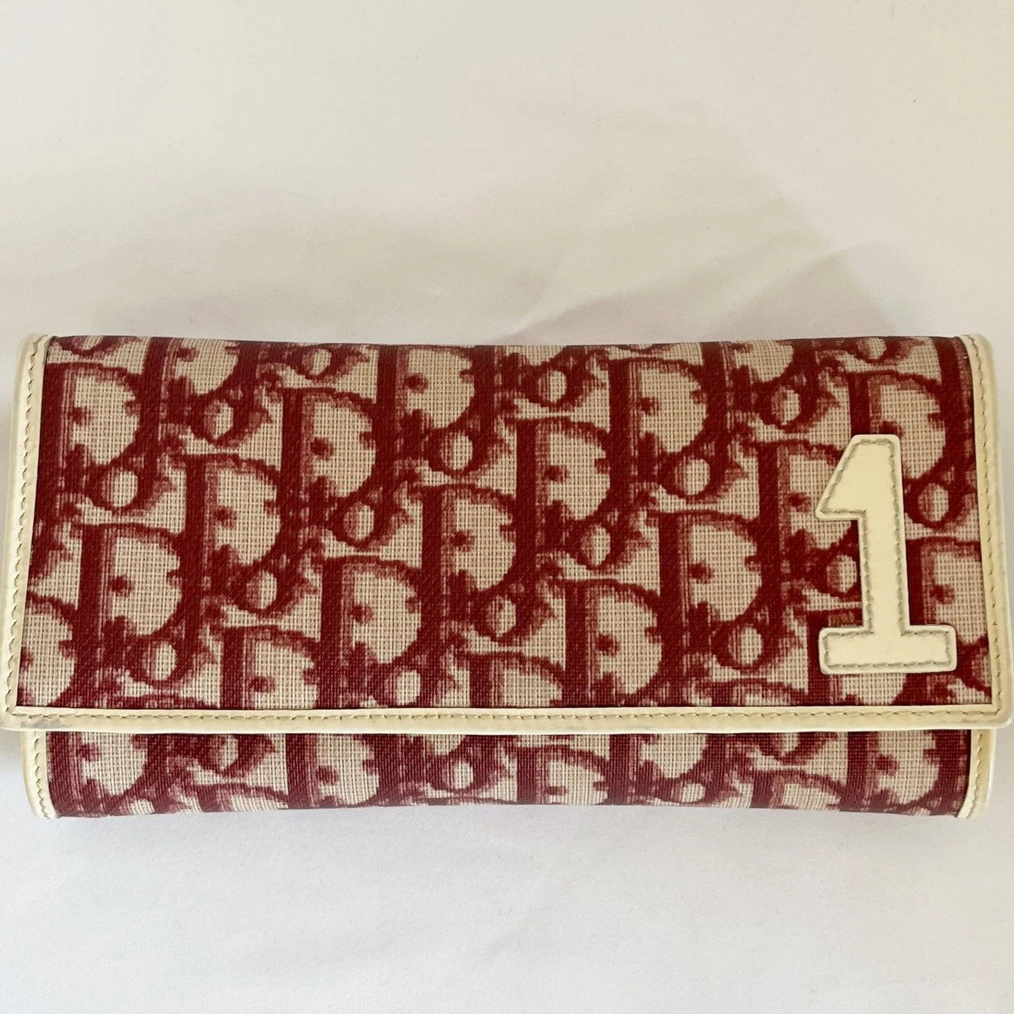 Portefeuille DIOR #1 par John Galliano rouge trotteur PVC 