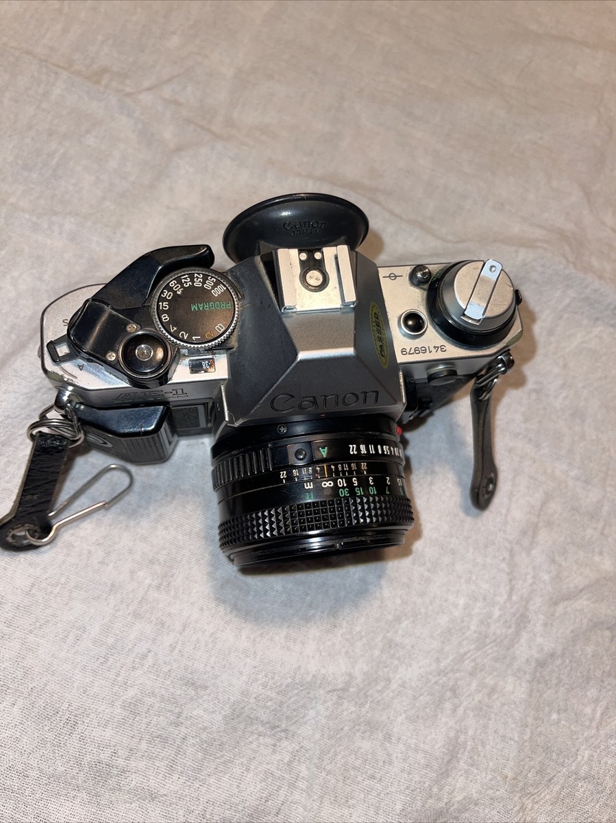 CANON AE-1 SLR PROGRAM Camera with FD 50mm 1:1.8 Lens Made in
