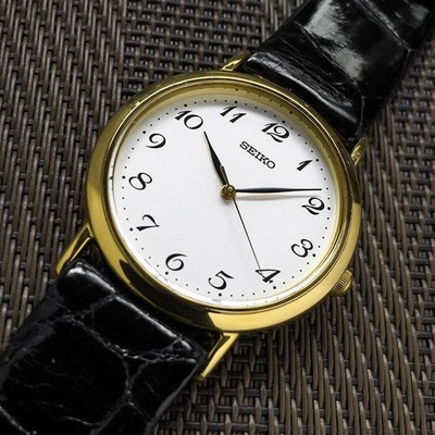Seiko Round Gold Case Arabic Numeral Dress Watch Thin Quartz Working