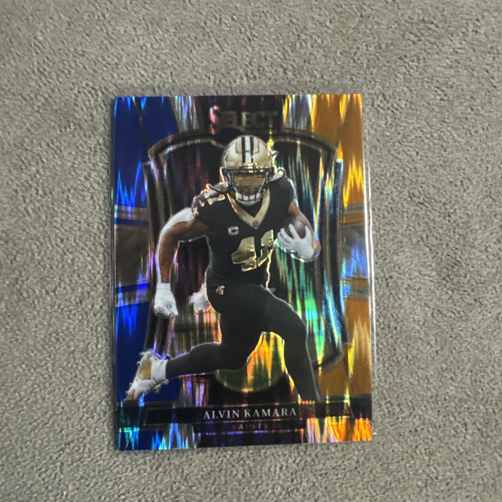 2025 Panini Select - Premier Level Alvin Kamara #140 Blue & Orange Prizm /35